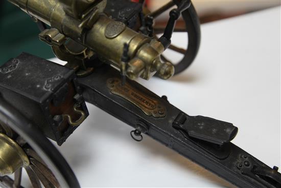 A brass and painted steel working model of an 1883 gatling gun, 14in.